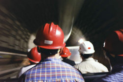 Tour members on a train inside the mountain