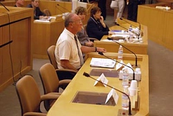 The two empty seats at the QA hearing