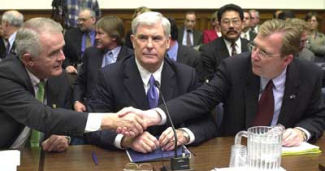 Gov. Kenny Guinn, center --  Jim Gibbons, R-Nev., left, shakes hands with state Sen. Jon Porter, R-Henderson