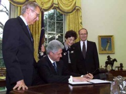 With President Clinton are, from left, Sen. Harry Reid, Rep. Shelley Berkley, and Sen. Richard Bryan.